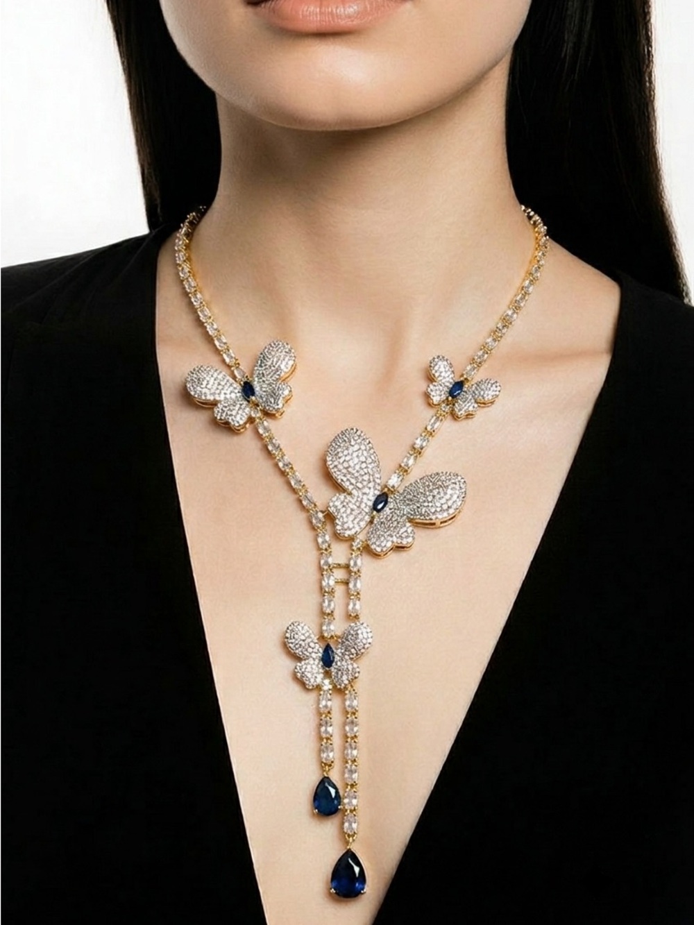 Elegant Gold Butterfly Necklace with Blue Gemstones